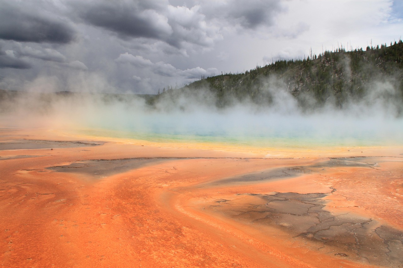The vibrant, rainbow-colored rings of the Grand Prismatic Spring in Yellowstone National Park.