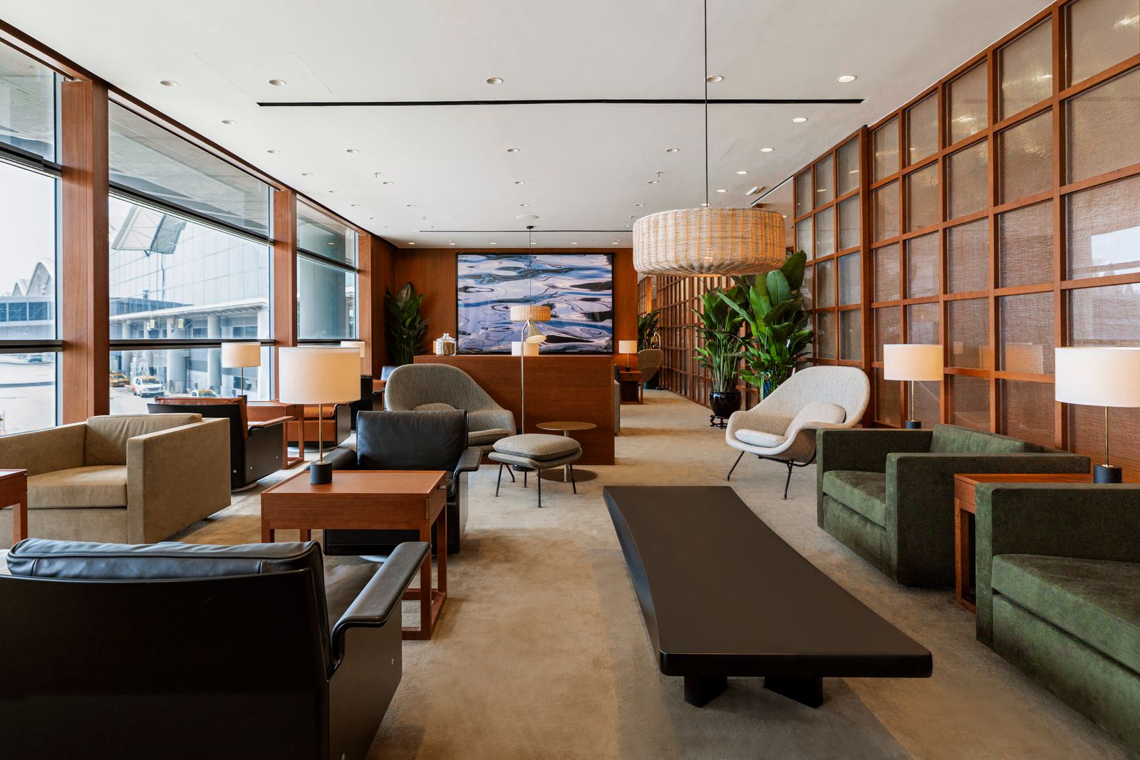 Modern residential-style furniture and interior design inside The Bridge lounge.