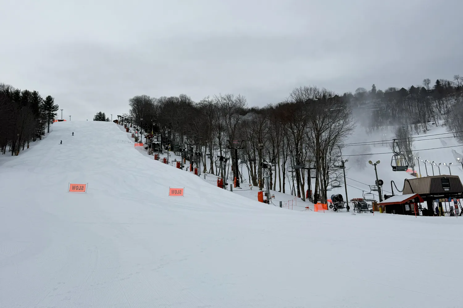 A ski slope at Appalachian Ski Mountain featuring ski lifts and snowy terrain.