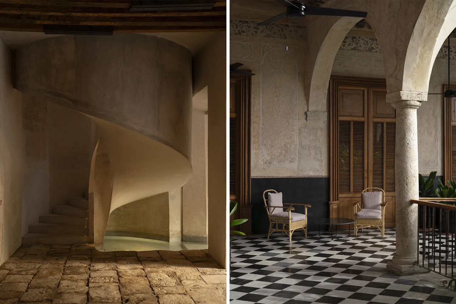 Interior view of a winding staircase and checkered floor under colonial arches.