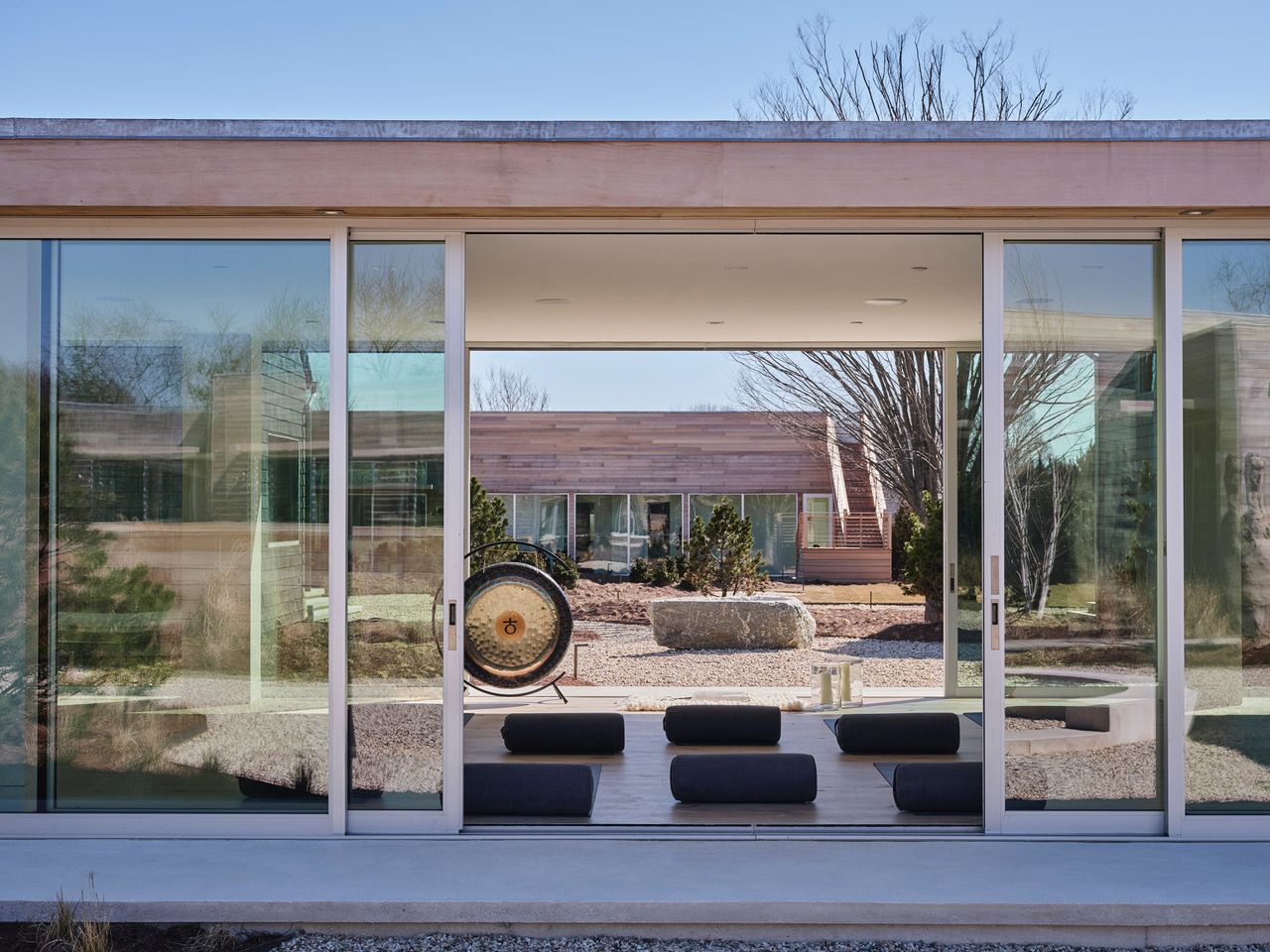Modern and minimalist wooden exterior of Shou Sugi Ban House in the Hamptons.