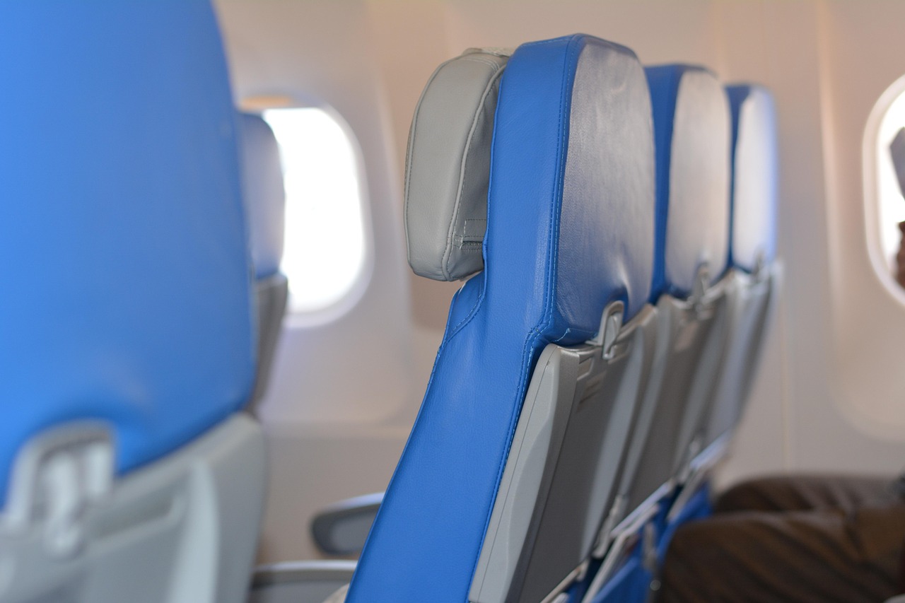 The transition from business class to a crowded economy cabin can be a shock for any traveler.