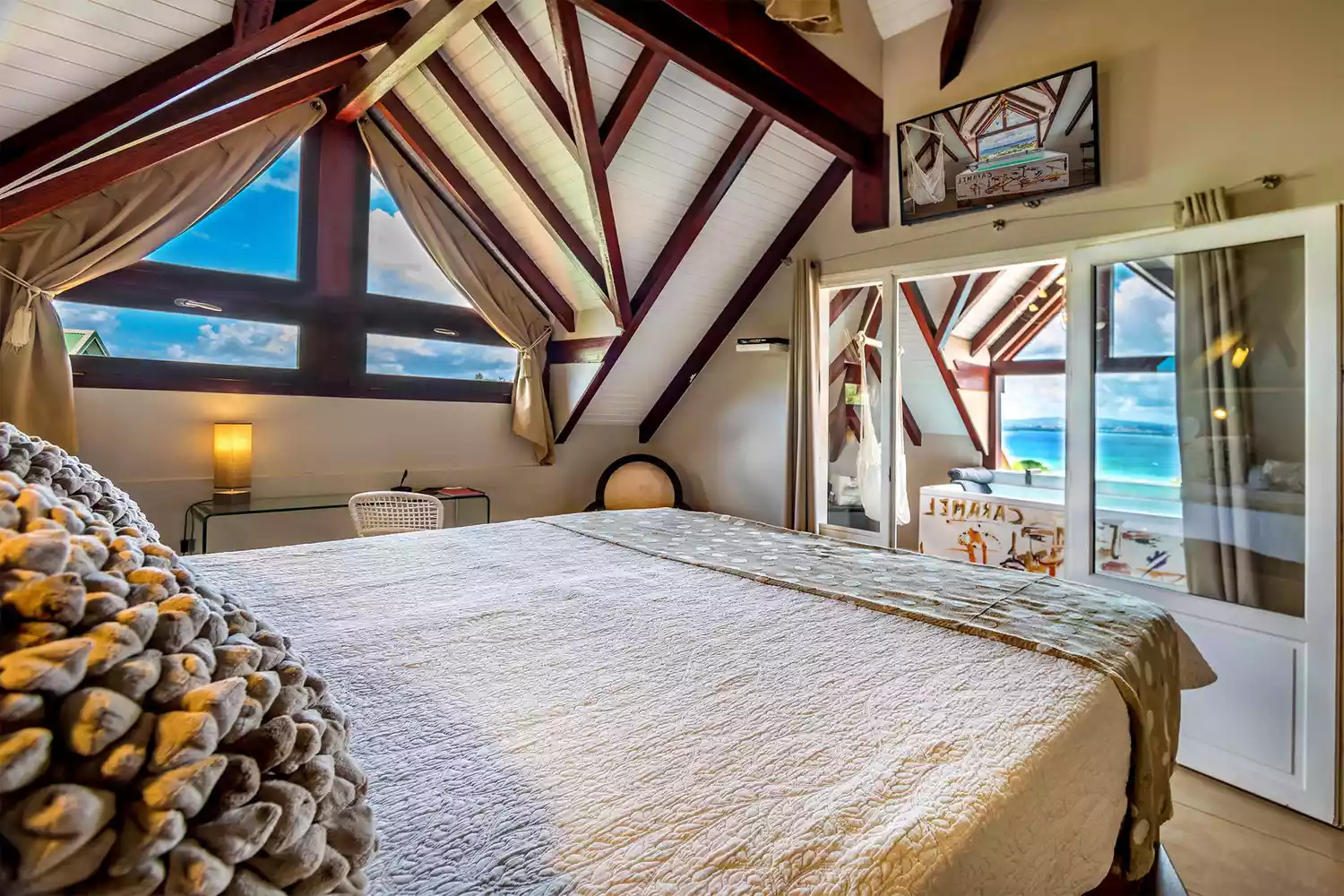 The luxury exterior and pool area of La Suite Villa in Martinique.