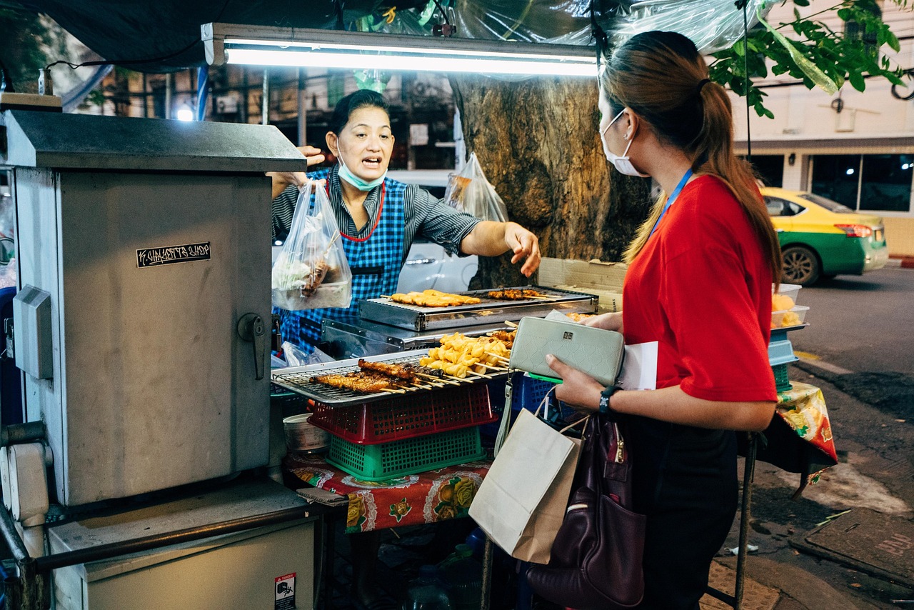 With over 500,000 vendors, Bangkok is the undisputed king of electric street food energy.