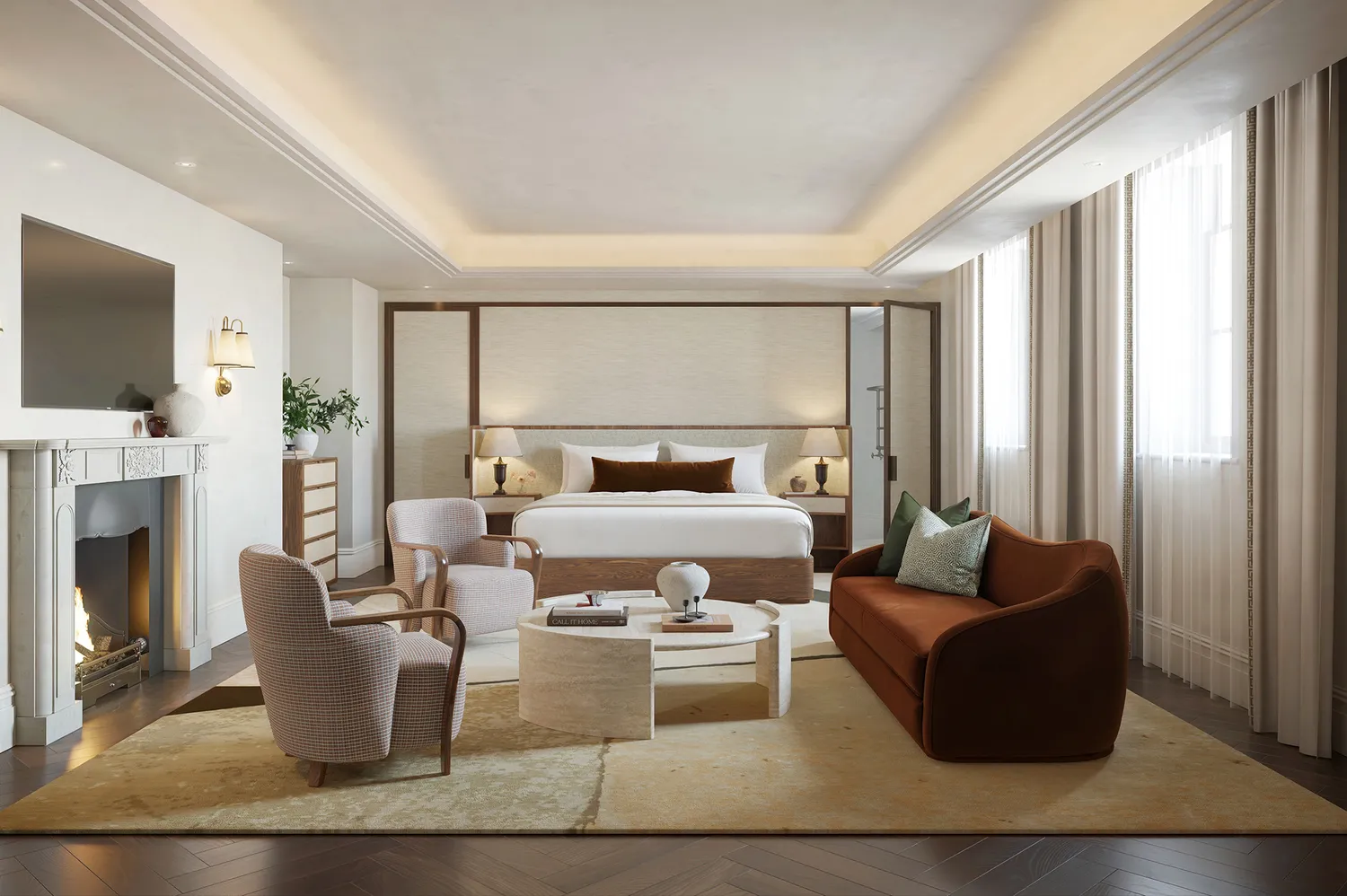 A luxury bedroom suite in the Victory Residence featuring a fireplace, seating area, and elegant neutral tones.